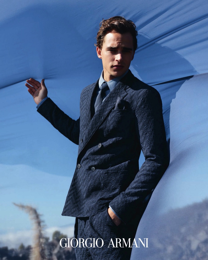 Model Pepe Barroso dons a sharp navy suit for Giorgio Armani's spring-summer 2020 campaign.