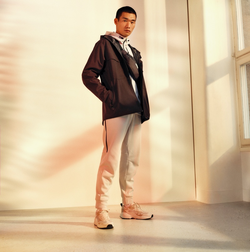 Kamui Tanaka models an athleisure look from H&M.