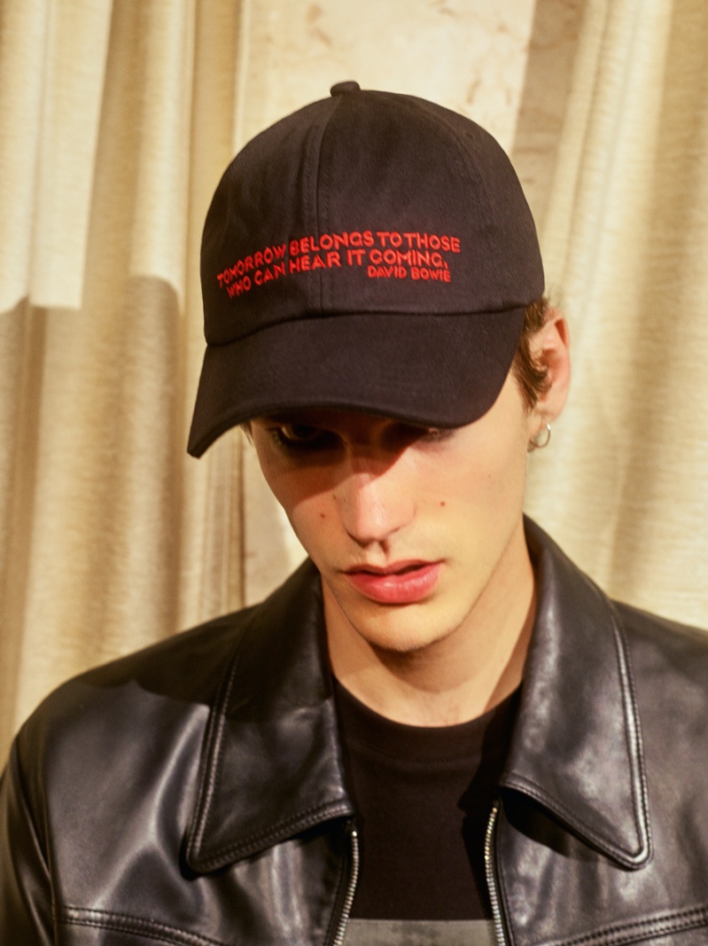 Reuniting with HUGO, Elias de Poot rocks a cap from its HUGO Loves Bowie capsule collection.