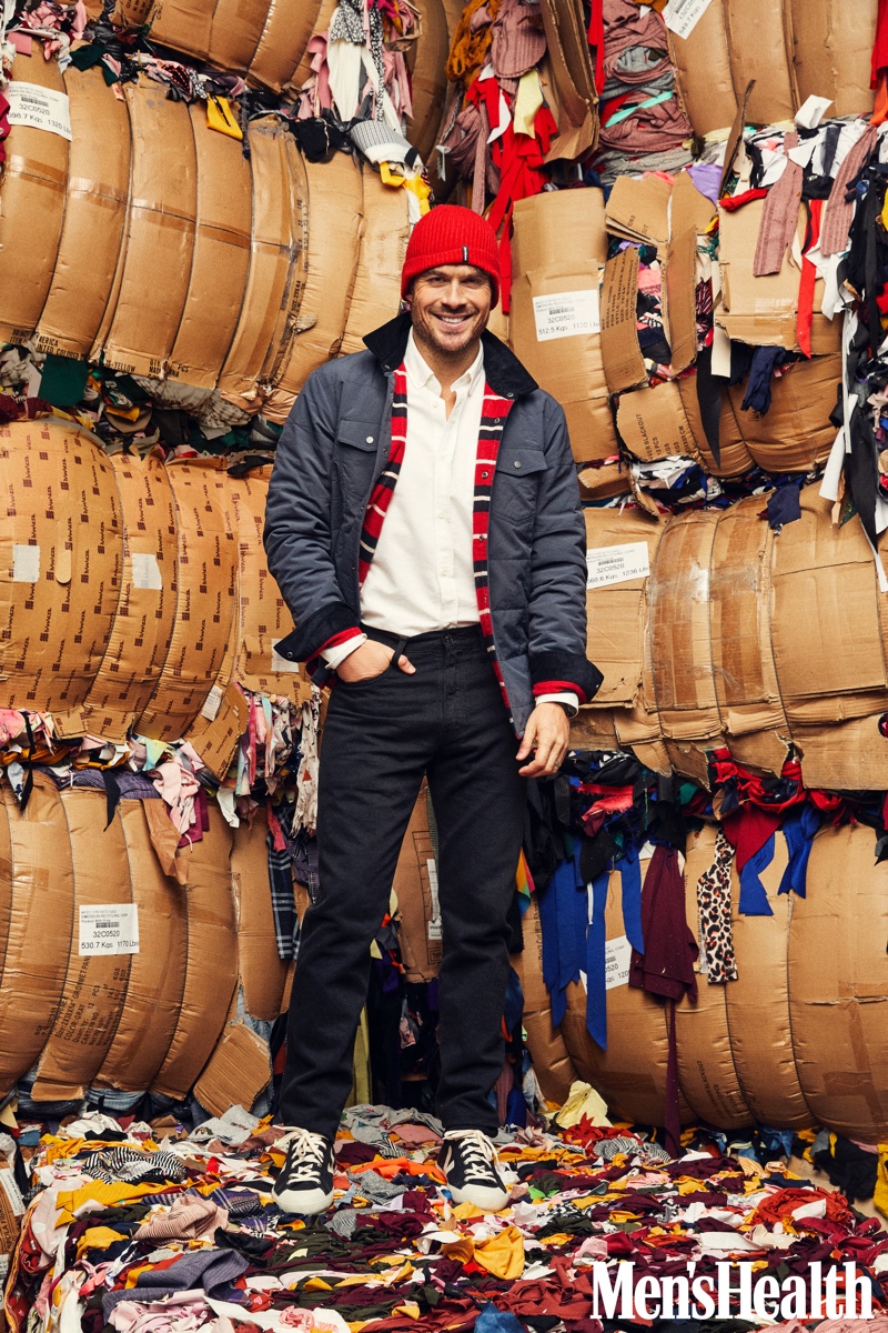 All smiles, Ian Somerhalder wears a Wellen jacket with a Tact & Stone shirt, Levi's jeans, Veja sneakers, and a Patagonia knit beanie for Men's Health.