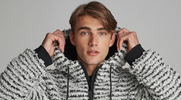 Karl Lagerfeld Paris Champions Athleisure Style with Après-Ski Collection Matthew Pollock sports a sherpa anorak from Karl Lagerfeld's après-ski capsule collection.