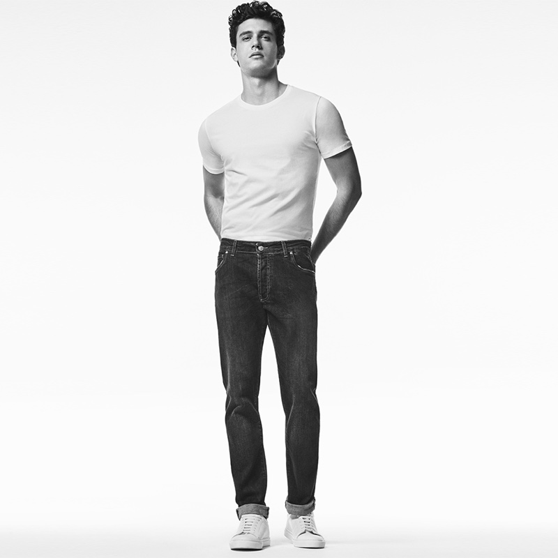 Sporting a t-shirt and regular fit jeans, Xavier Serrano wears Liu Jo Uomo.