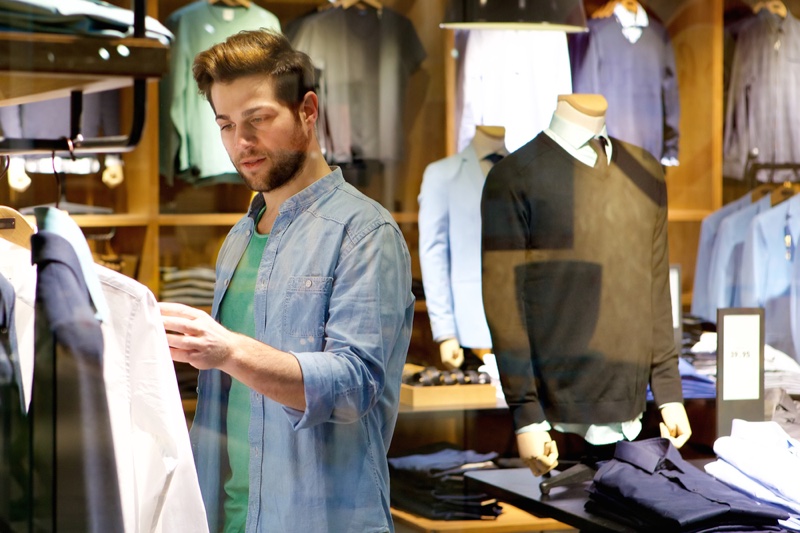 Man Choosing Clothes Store Window