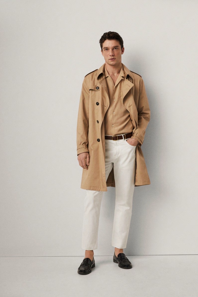 Embracing neutrals, Alexis Petit dons a trench coat from Mango.