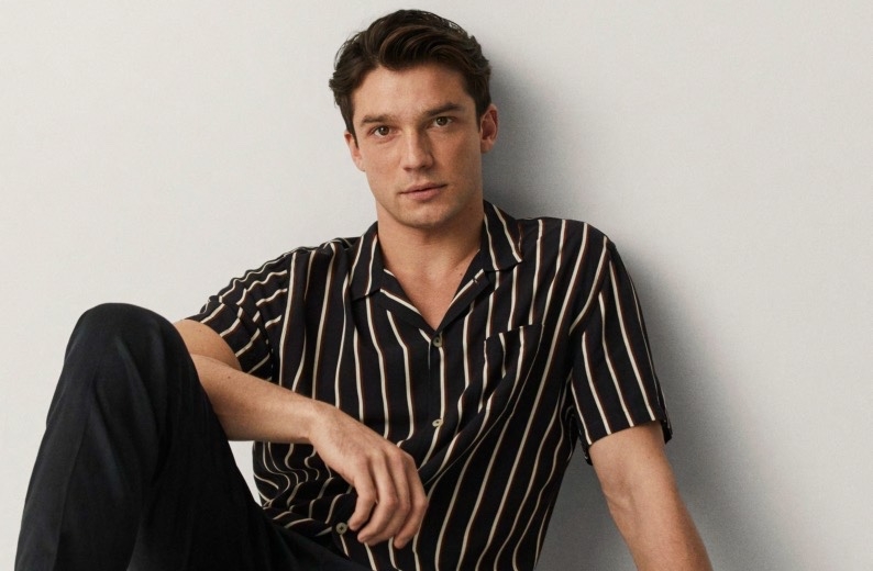 Alexis Petit Models Classic Spring Styles for Mango Model Alexis Petit wears a striped short-sleeve shirt with trousers from Mango.
