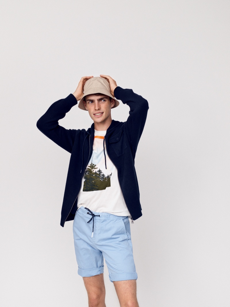 Channeling nineties style, Aidan Walsh wears men's clothing from Marc O'Polo's spring-summer 2020 collection.