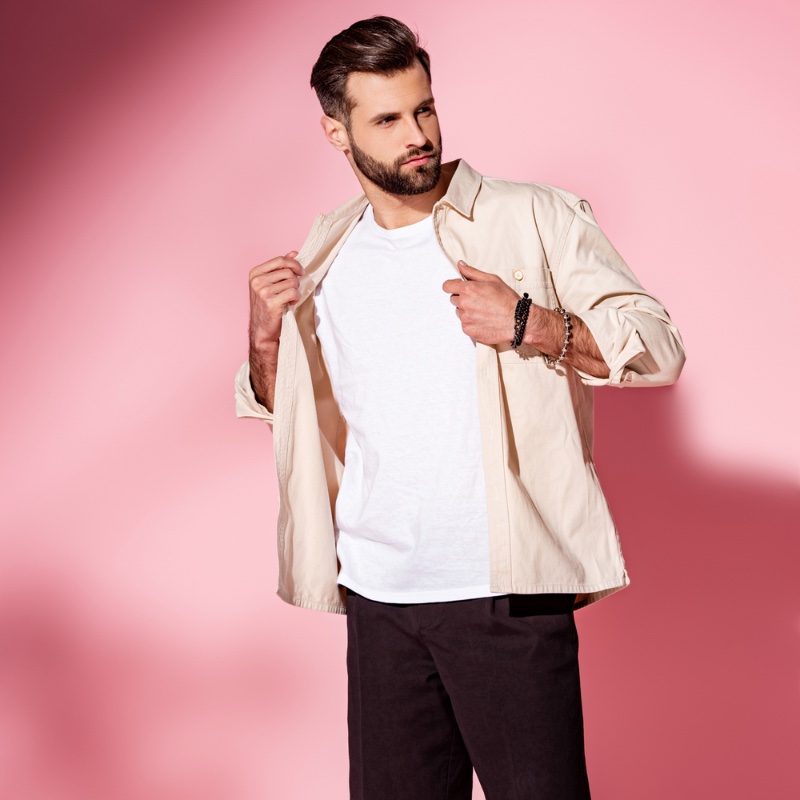 Casual and effortless, styling a button-down shirt over a t-shirt is timeless. » 5 Ways to Style Men's Button-Down Shirts Casual and effortless, styling a button-down shirt over a t-shirt is timeless.
