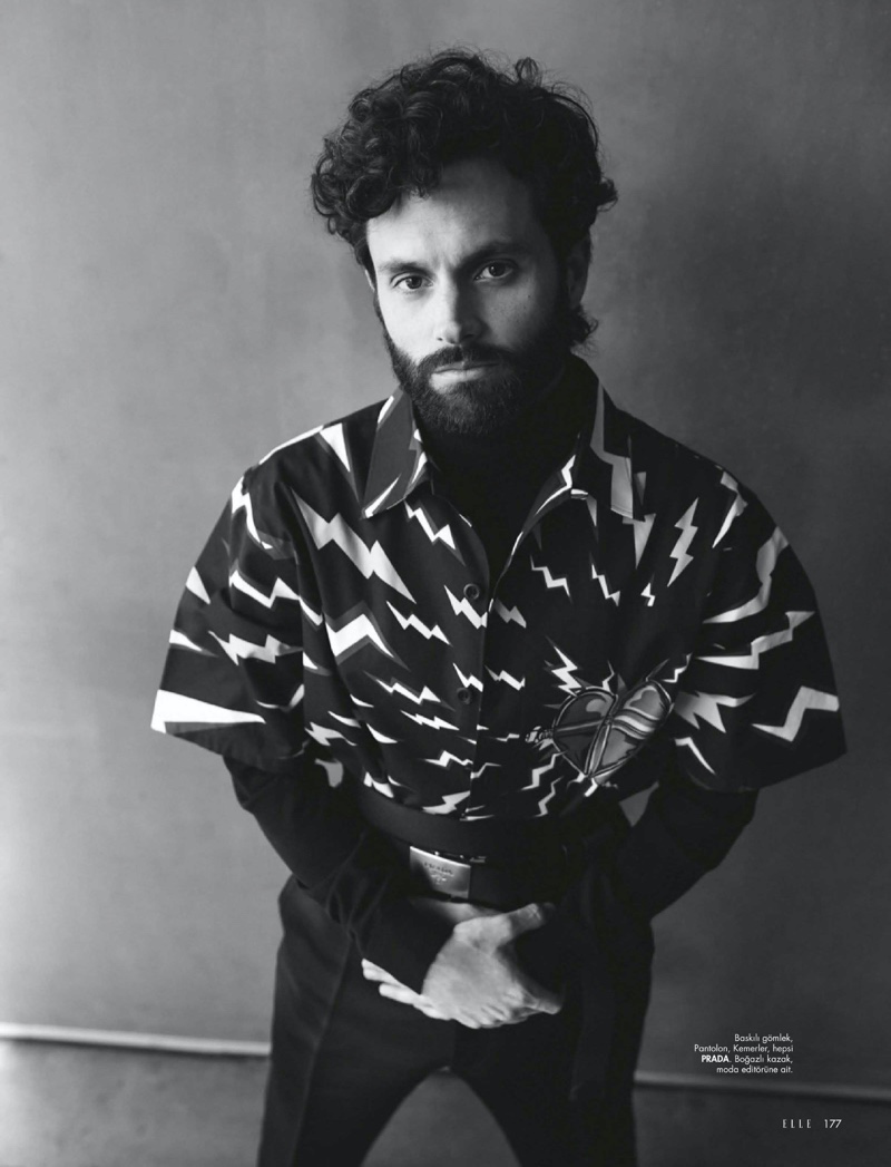 Making a graphic statement, Penn Badgley dons Prada.