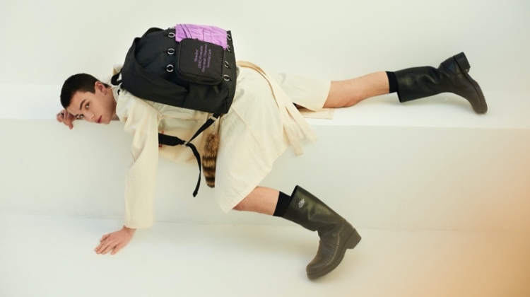 Nika Jovanovic sports a backpack from the Raf Simons x Eastpak spring-summer 2020 collection.