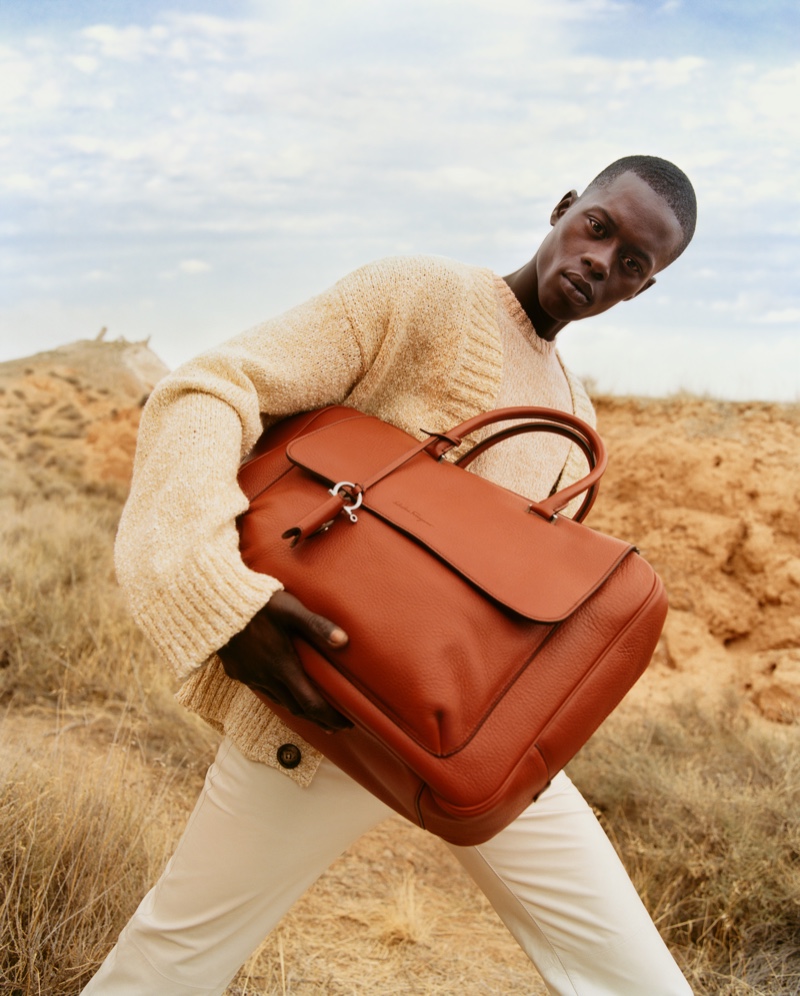 A vision in creamy hues, Alpha Dia stars in Salvatore Ferragamo's spring-summer 2020 men's campaign.