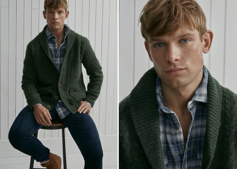 Standing out in green, Elliott Reeder rocks a shawl neck cardigan sweater from LE 31.