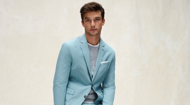Embracing a pop of color, Alexis Petit sports a suit from Tommy Hilfiger Tailored's spring-summer 2020 collection.