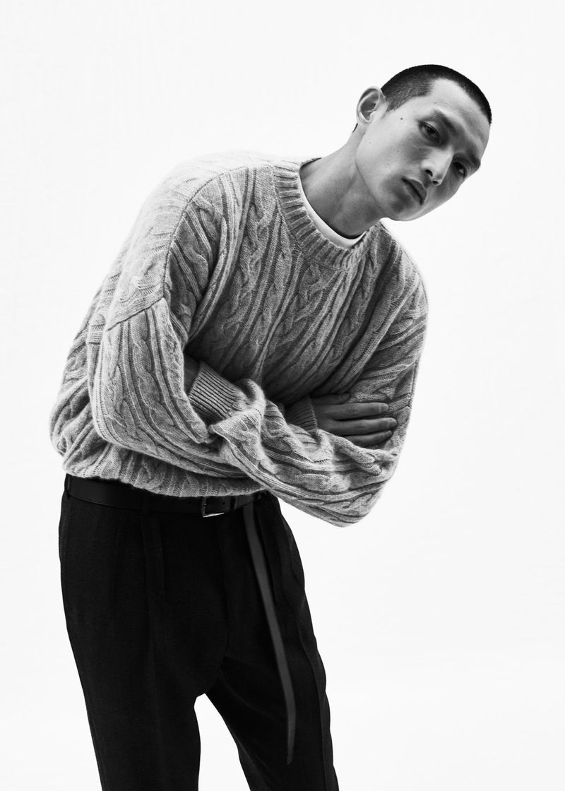 Zhang Wenhui sports a cable-knit sweater from Agnona's fall-winter 2020 collection.