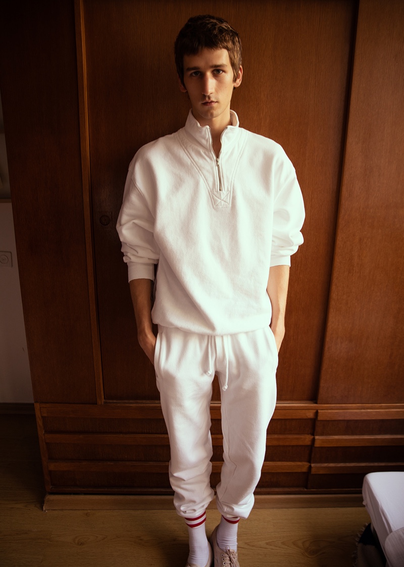 Sporting all white, Etienne de Testa stars in American Vintage's spring-summer 2020 campaign.
