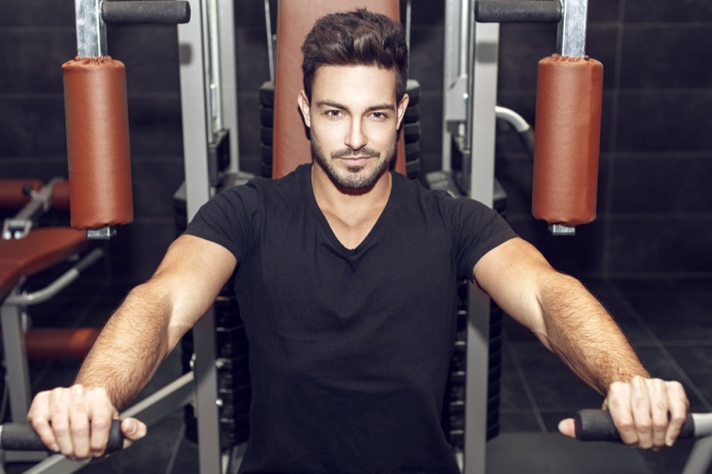 Attractive Man Black V-Neck Shirt Working Out