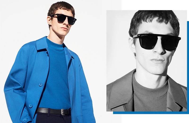 Embracing monochromatic style, Henry Kitcher wears a blue short-sleeve sweater and coat from BOSS.