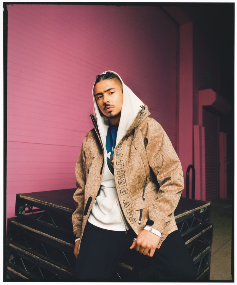 Front and center, Quincy Brown dons a jacket from the Bape x Coach collection.