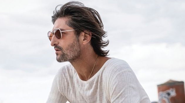 Tony Ward Stars in Bruno Magli Spring '20 Campaign Embracing neutrals, Tony Ward completes his look with brown leather boots for Bruno Magli's spring-summer 2020 campaign.