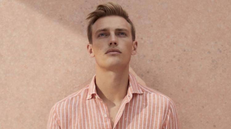Victor Nylander dons a striped linen shirt for Daks' spring-summer 2020 campaign.
