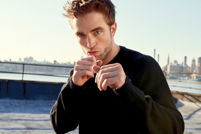 Putting up a fighting pose, Robert Pattinson stars in Dior Homme's fragrance campaign.