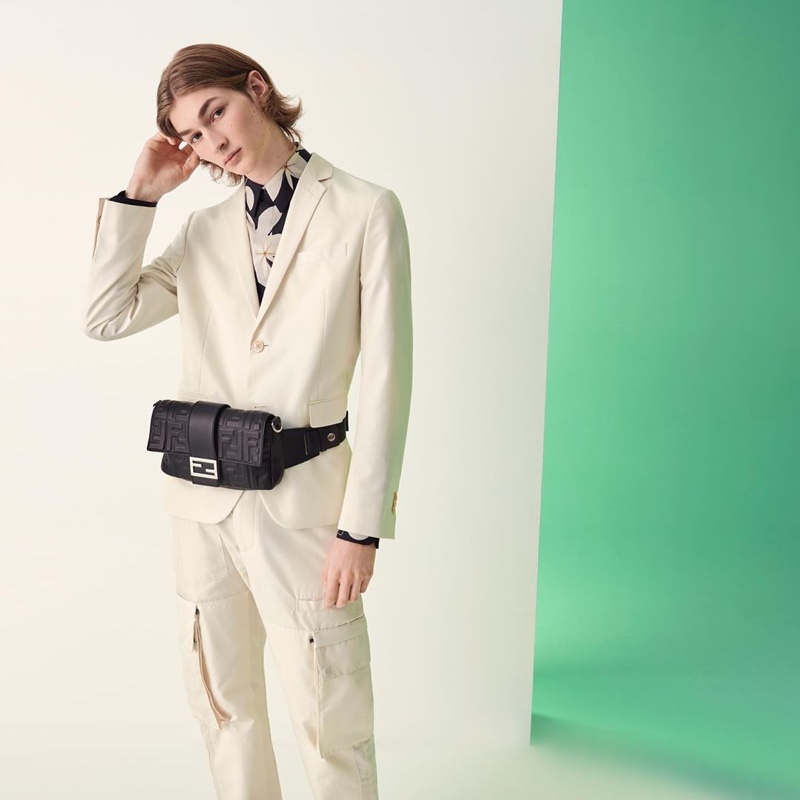 Robbie Lyons embraces a light monochromatic look with a leather belt bag from Fendi's spring-summer 2020 men's collection.