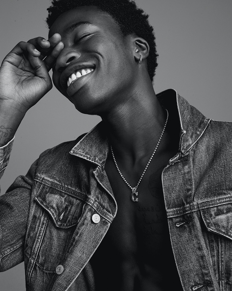 All smiles, Cheikh Tall models a Gap denim jean jacket.