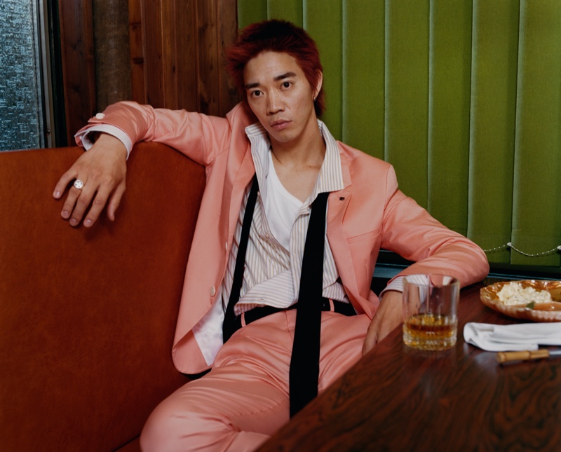 Takuro Yamazoe sports a coral suit for HUGO's spring-summer 2020 campaign.