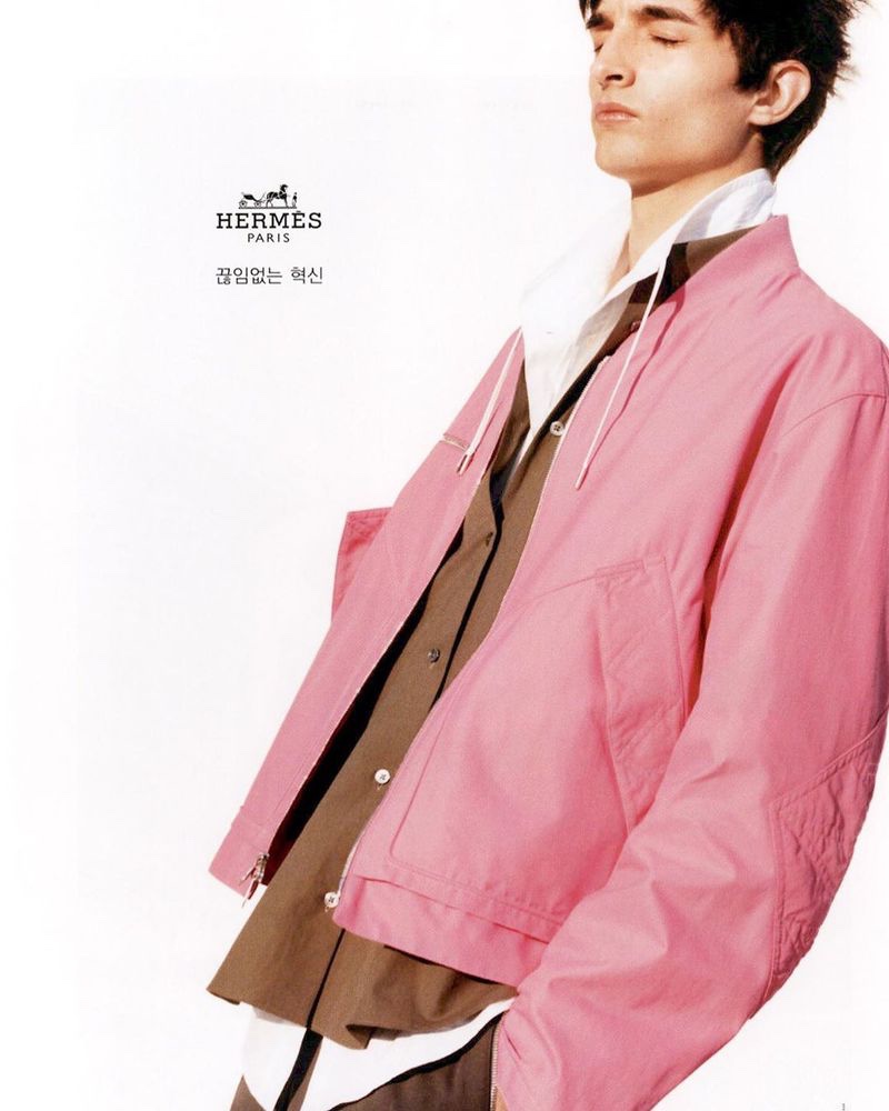 Pablo Fernandez dons a pink jacket for Hermès' spring-summer 2020 campaign.