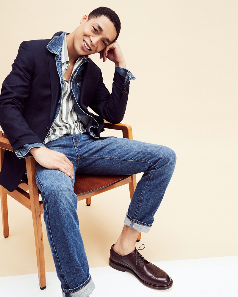 All smiles, Luke Cousins wears a smart denim look from J.Crew.