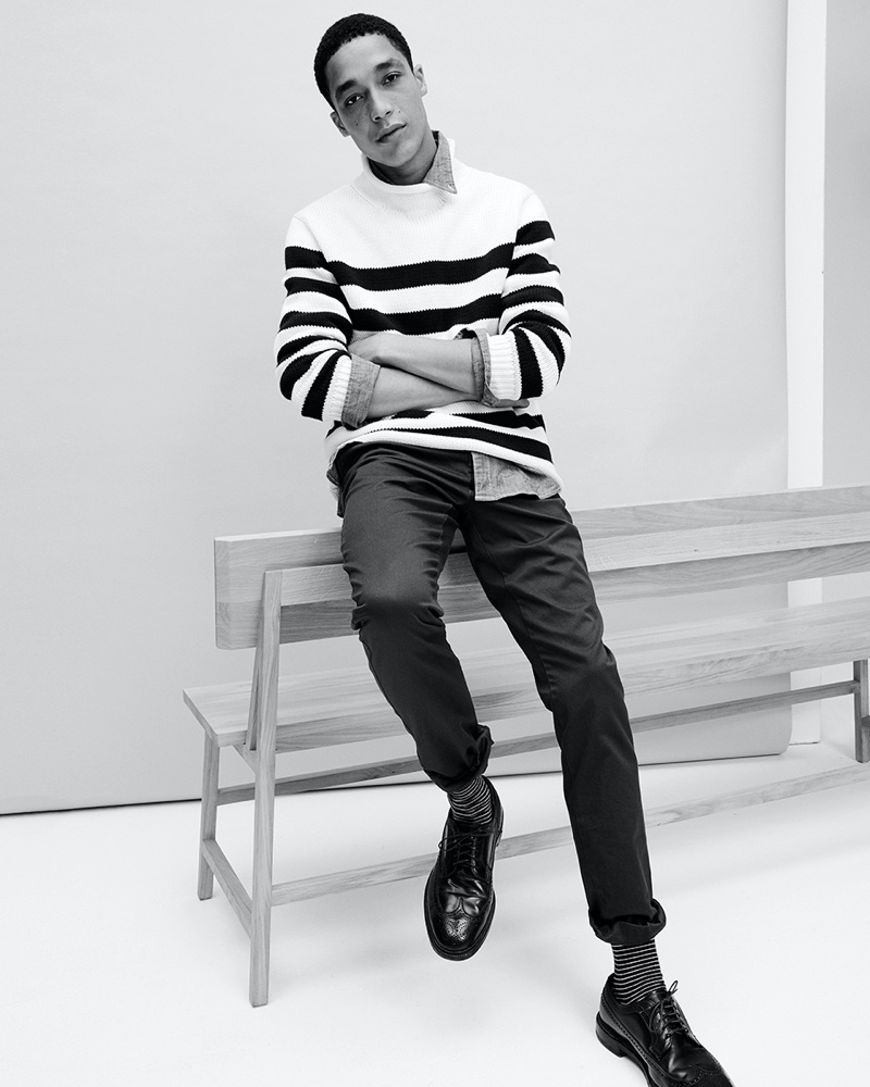 Luke Cousins sports a striped sweater by J.Crew.