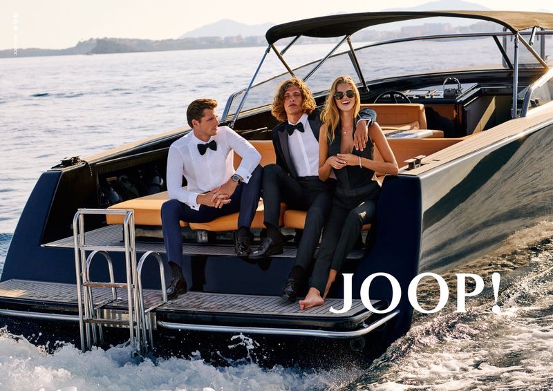 Taking to the beach, Edward Wilding, Umberto Villahermosa, and Kim Riekenberg front JOOP!'s spring-summer 2020 campaign.