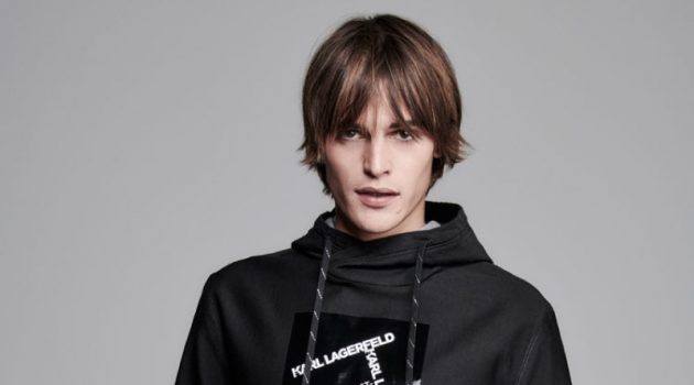 Parker Rocks Black, White & Denim in Karl Lagerfeld Spring '20 Collection Parker van Noord goes sporty in a hoodie from Karl Lagerfeld's spring-summer 2020 collection.