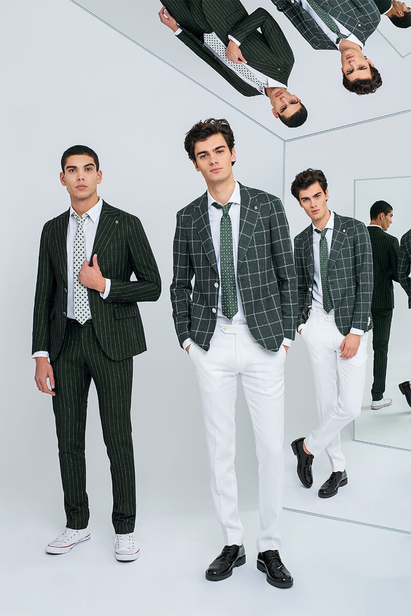 Pouring on the charm, Samuele Urbani and Alexandru Gorincioi come together for Lubiam's spring-summer 2020 campaign.