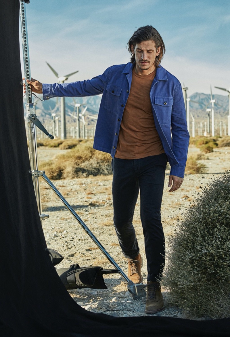 Brushing up on spring style, Jarrod Scott models a Todd Snyder Italian suede snap Dylan jacket  and Made in L.A. slub jersey long-sleeve t-shirt.