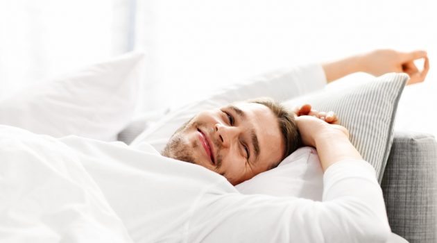 Wake Up Refreshed & Energized: 3 Tips for Improving the Quality of Your Sleep Man Waking Up in Bed