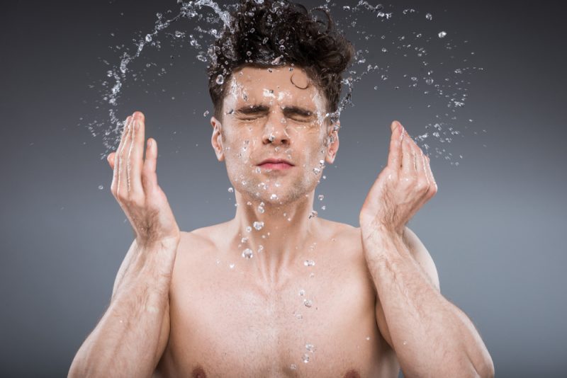 Man Washing Face
