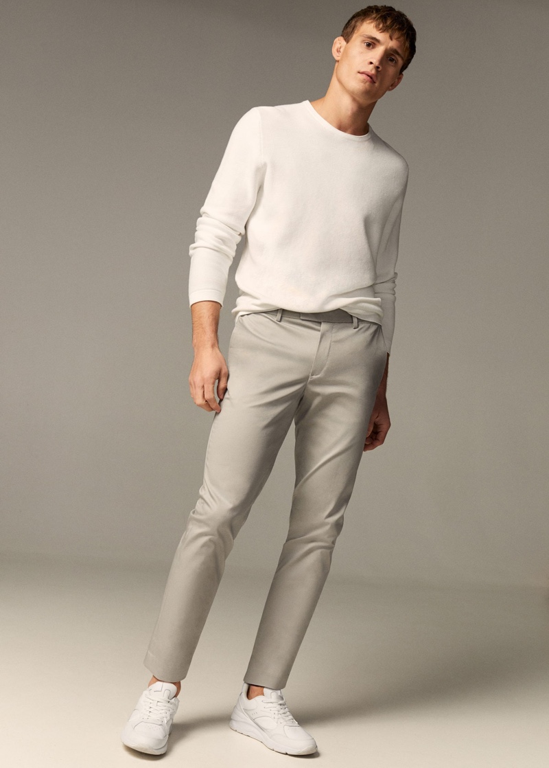 Julian Schneyder dons a neutral-colored look from Mango.