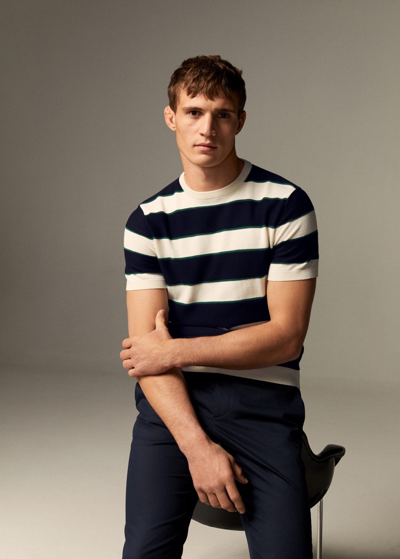 Connecting with Mango, Julian Schneyder sports a striped short-sleeve knit.