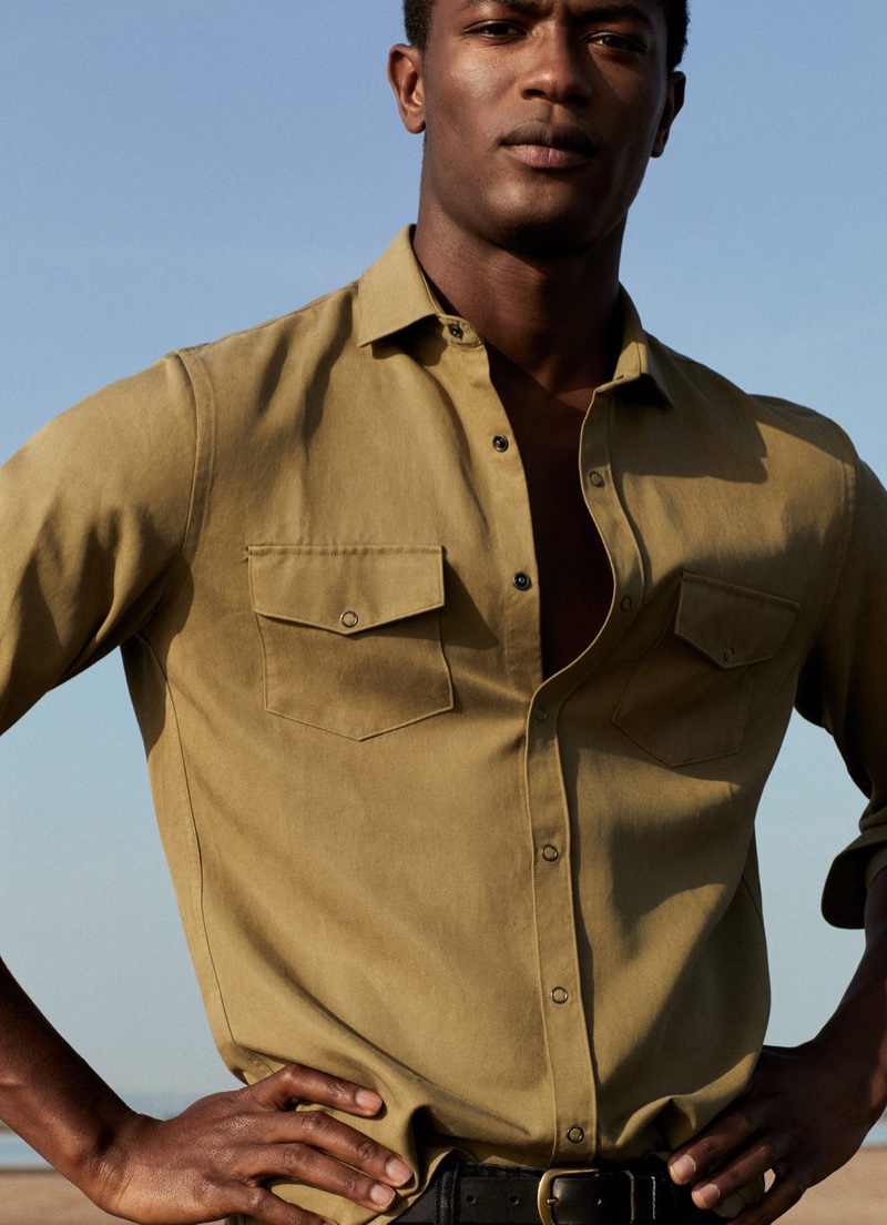 Front and center, Hamid Onifade sports a spring shirt from Mango.