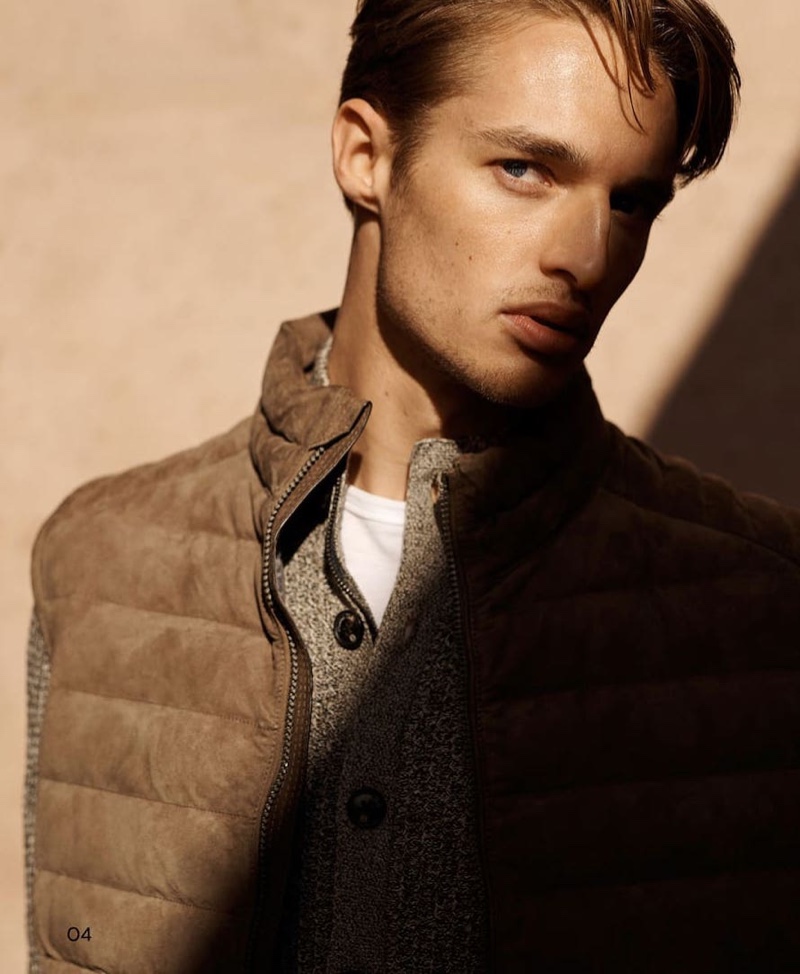 Layering, Morton Nielsen dons a quilted vest with a knit from Massimo Dutti.