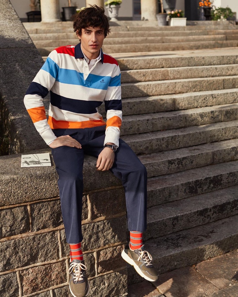 Oscar Kindelan sports a colorful rugby shirt from GANT.