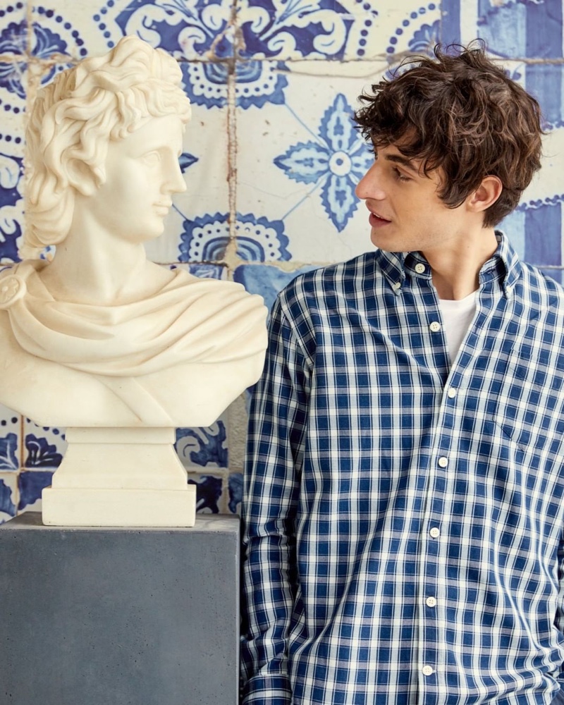 Connecting with GANT, Oscar Kindelan models the brand's Hugger shirt.