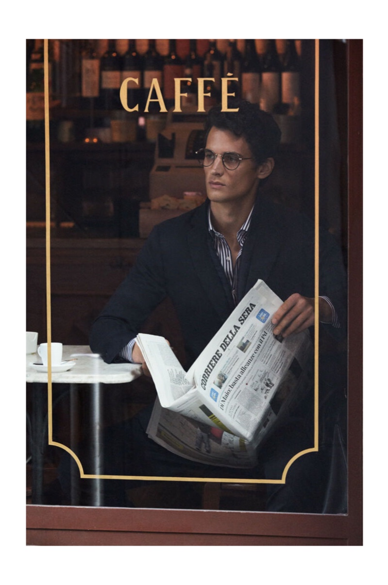 Making time for an espresso and a newspaper, Garrett Neff wears Pedro del Hiero.