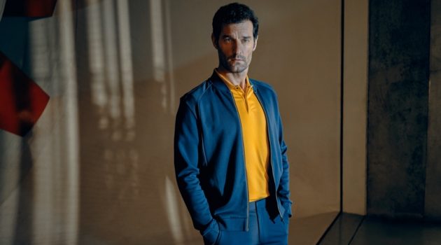 Mark Webber Returns as Face of Porsche x BOSS Collection Embracing blue and yellow, Mark Webber fronts the Porsche x BOSS spring-summer 2020 campaign.