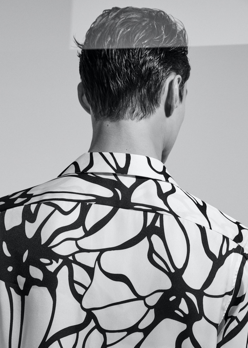 Donning a graphic shirt, Adrien Sahores makes an appearance in Reiss' spring-summer 2020 campaign.