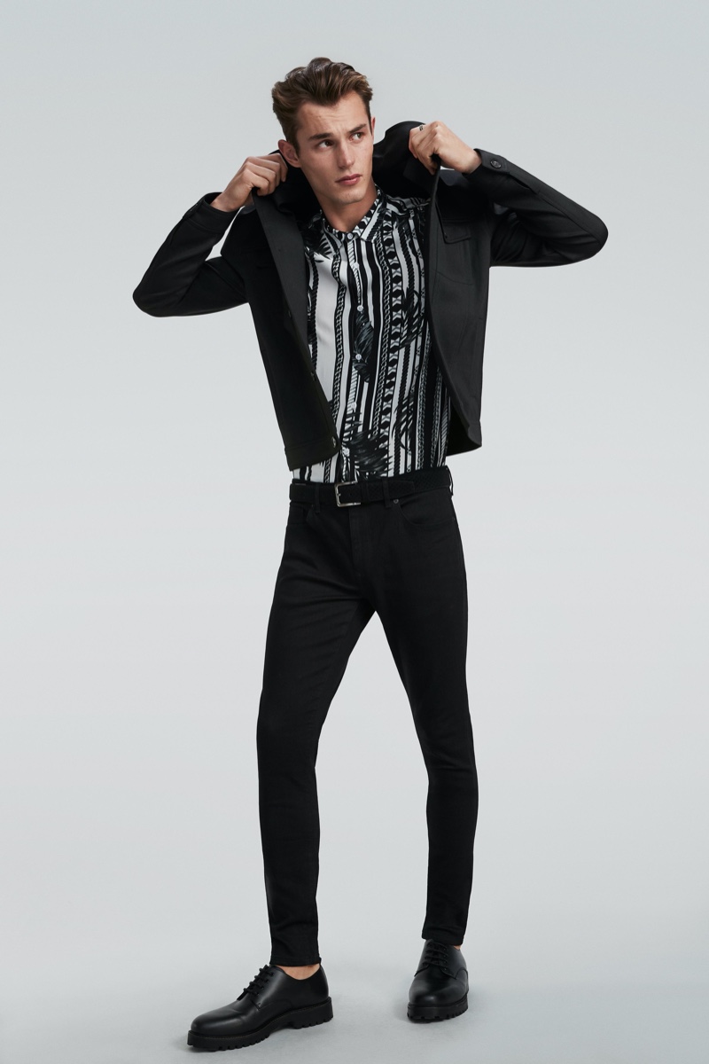 British model Kit Butler rocks black denim for River Island's spring 2020 campaign.