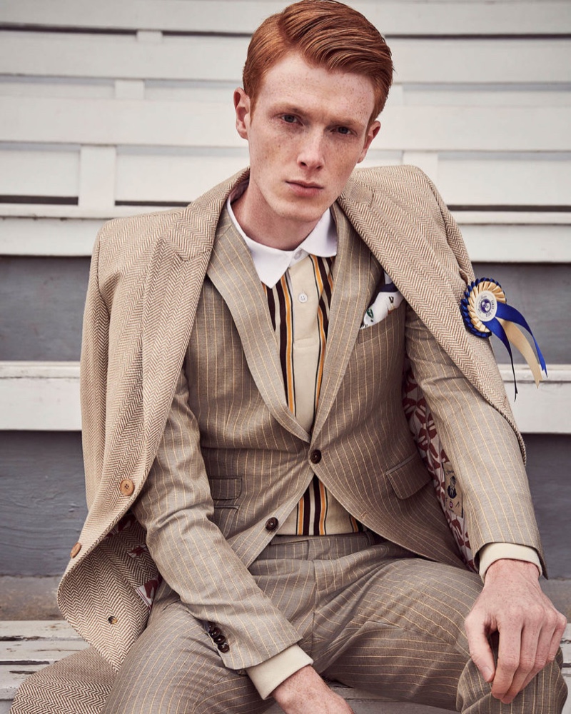 Embracing a neutral color scheme, Linus Wordemann wears a smashing look from Savile Row by CG.