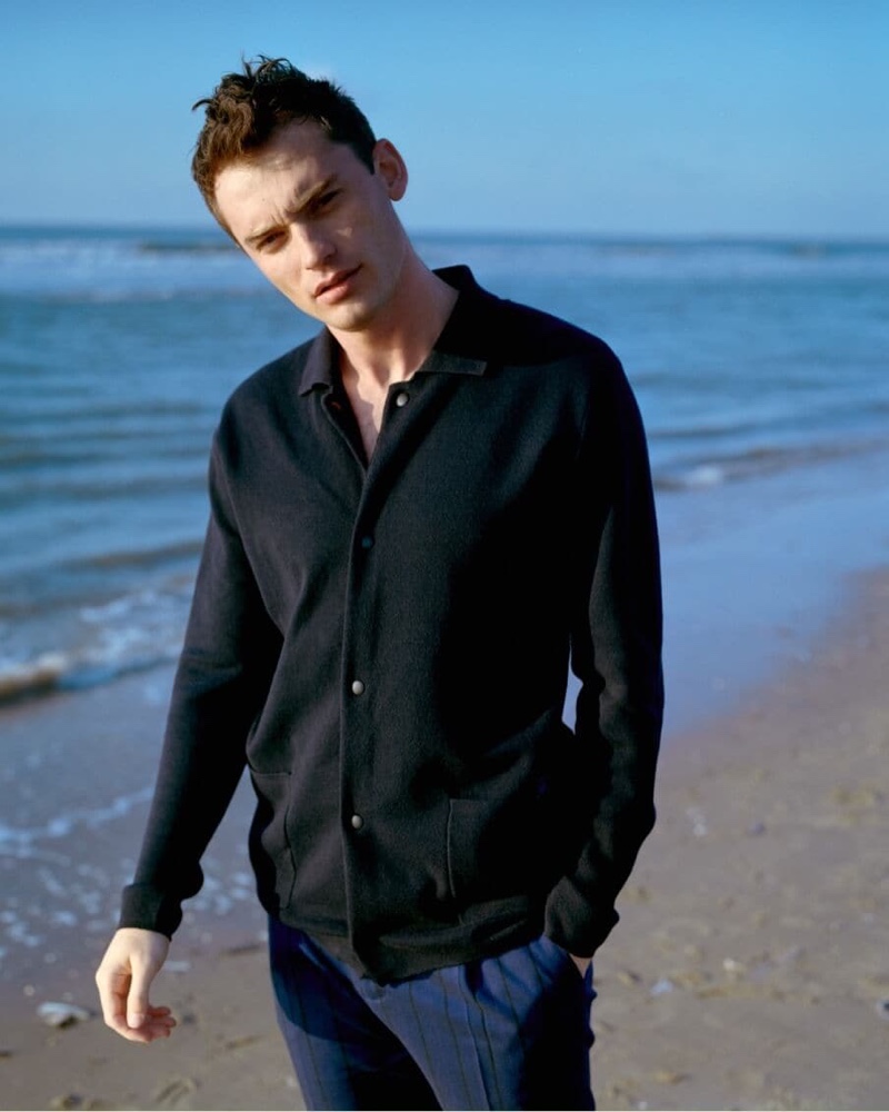 Enjoying a stroll, Harrison Griffiths models a snap button cardigan from Scotch & Soda.