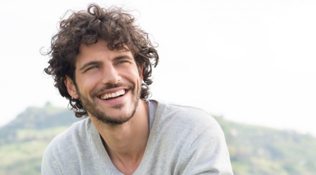 Ways to Reach Financial Freedom Smiling Attractive Man Outdoors Grey Sweater