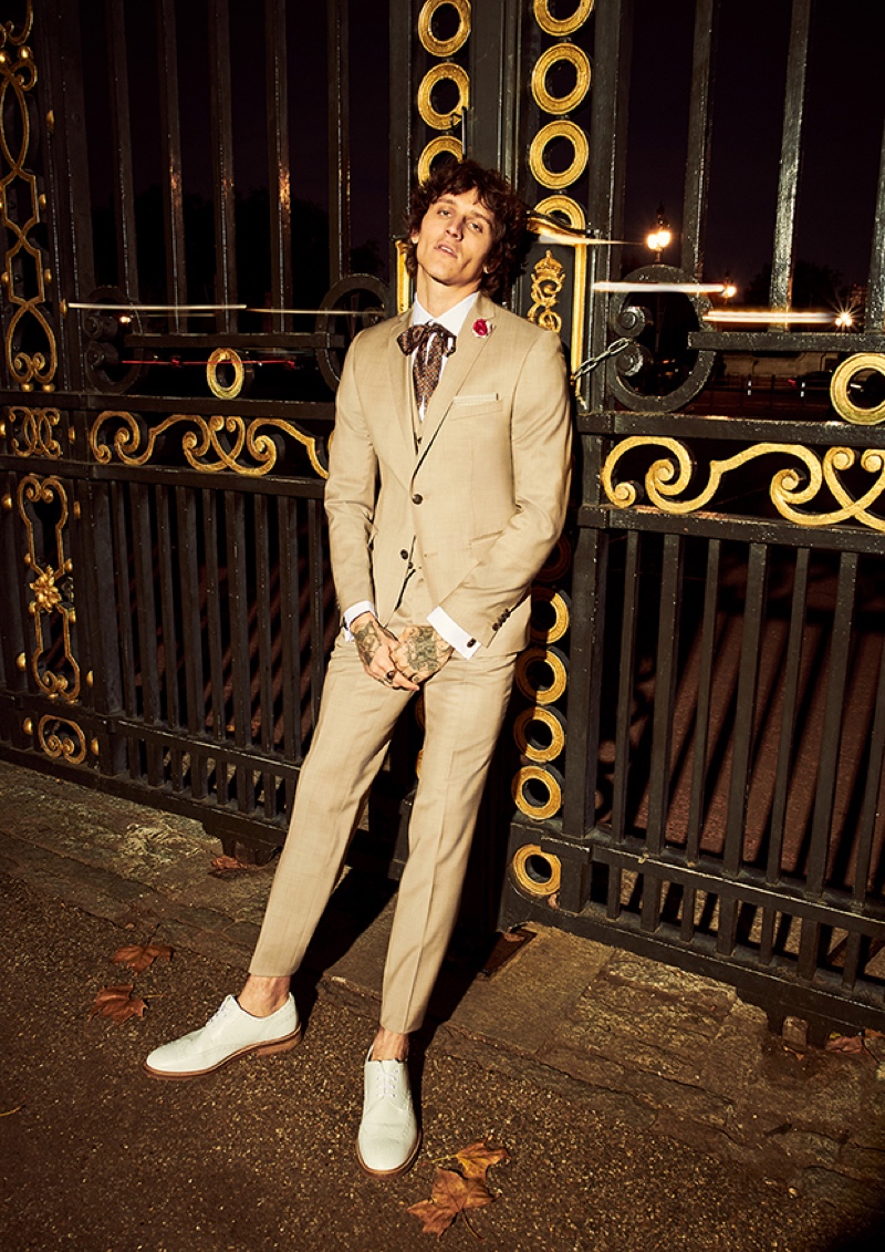 Leebo Freeman dons a tan suit from the spring-summer 2020 Your Own Party by CG collection.